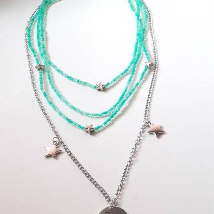 Four-piece Necklace Made Of Glass Beads And..