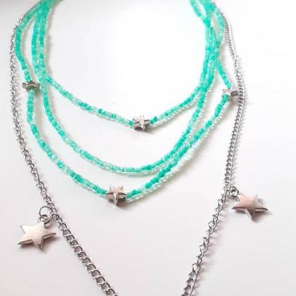 Four-piece Necklace Made Of Glass Beads And..